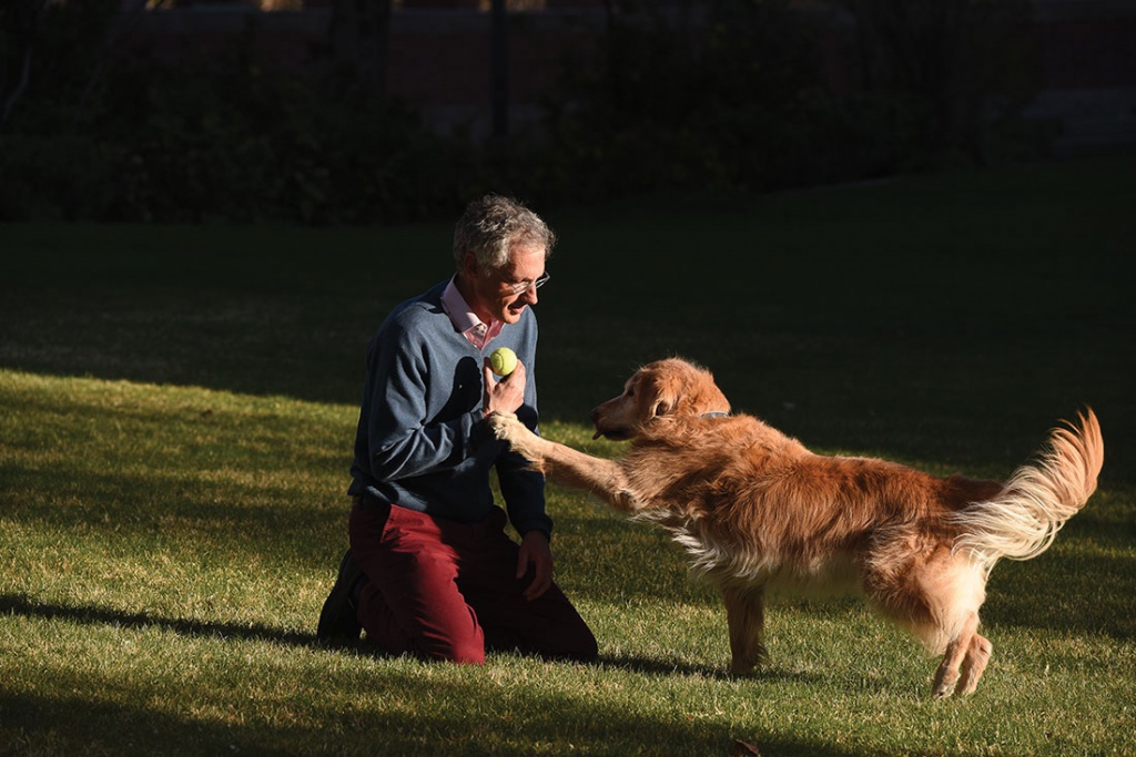 Honors program director Richard Badenhausen and dog Scout