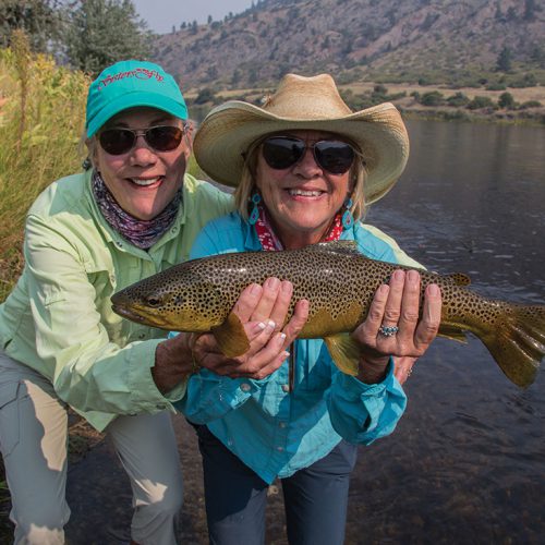 Maurrie Sussman and her sister Rebecca Clark fishing