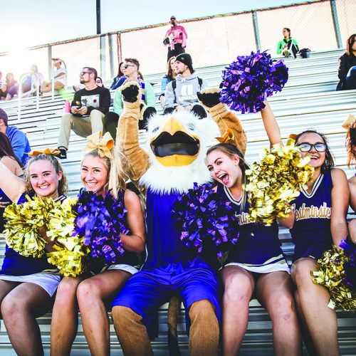 griffin mascot and cheerleaders