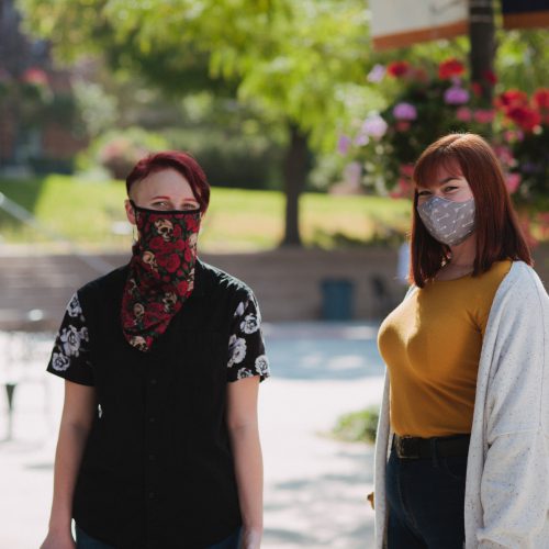 masked students outside